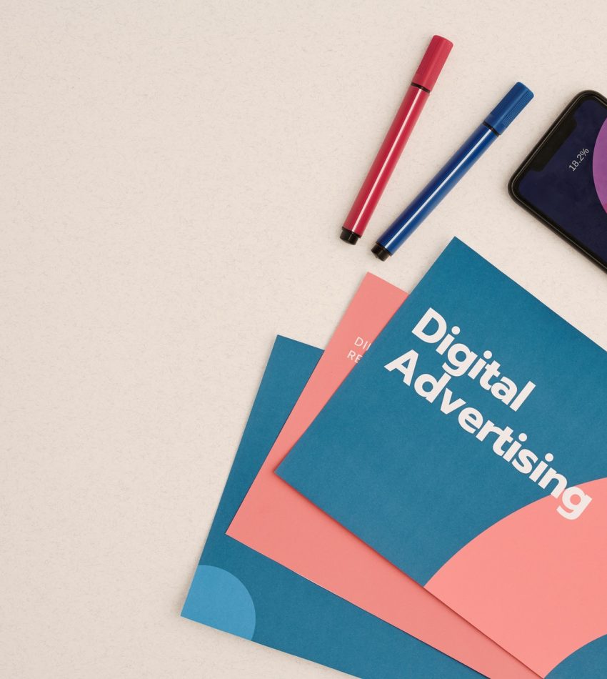 flat-layout-of-digital-advertising-brochures-and-phone-with-financial-diagram.jpg